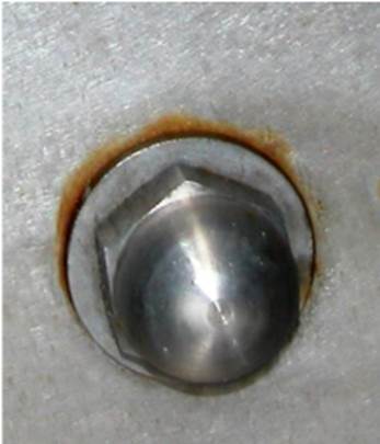 Crevice corrosion under a Type 316 bolt