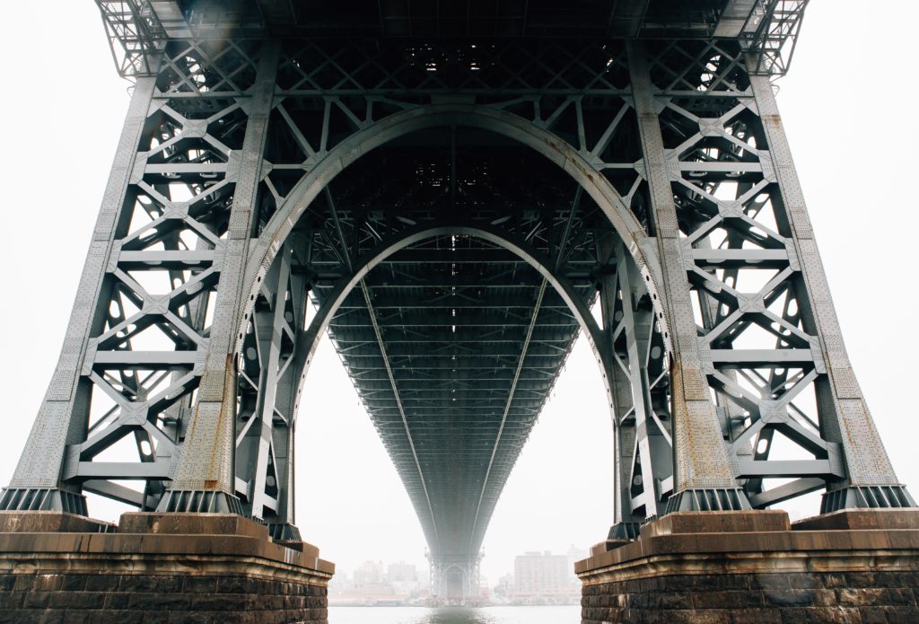 Structure underneath bridge and base