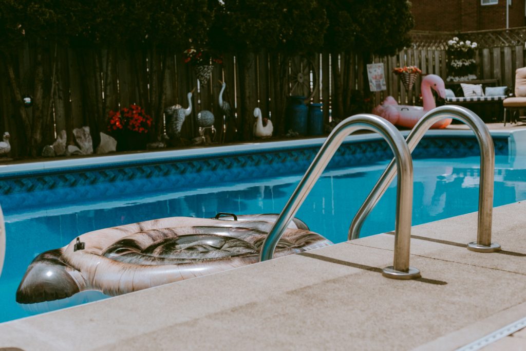 swimming pool with floating turtle raft